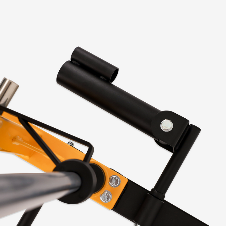 Close-up of a bicycle frame with black and orange components on a white background