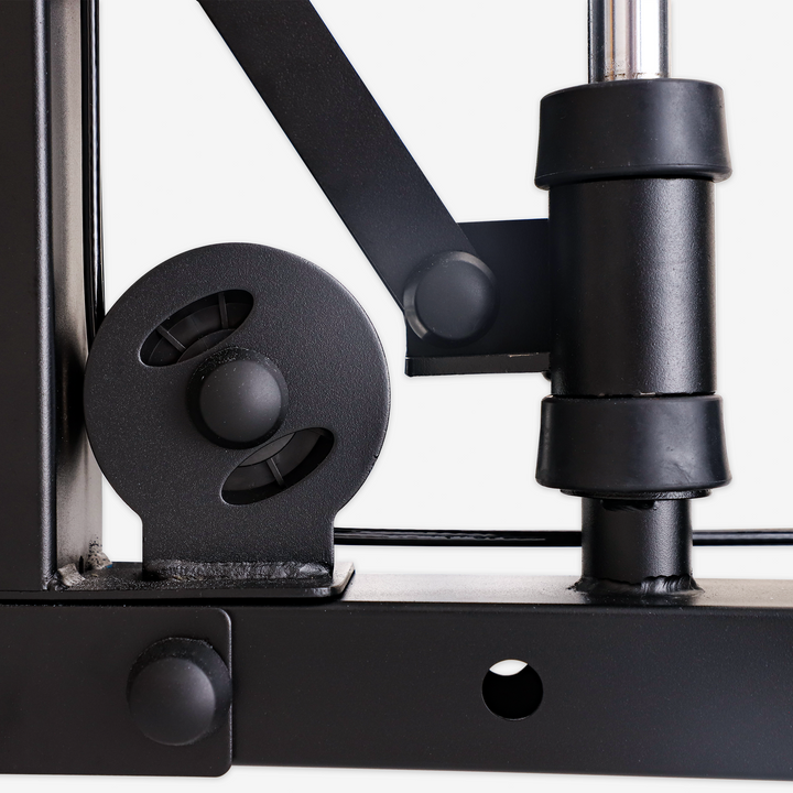 Close-up of a black mechanical component on a white background