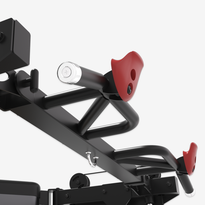 Close-up of a black and red mechanical device on a white background