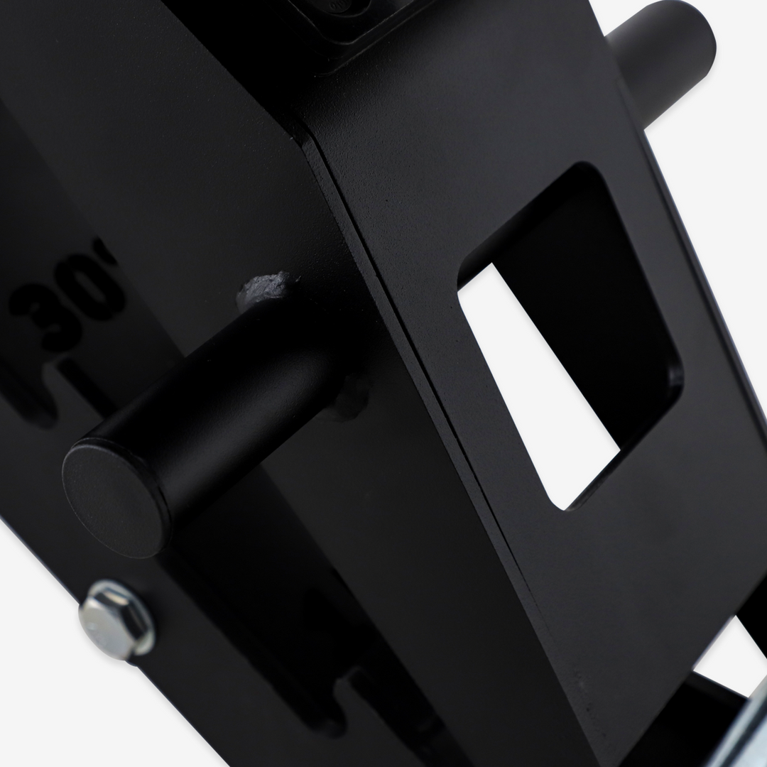 Close-up of a black mechanical component with a white background