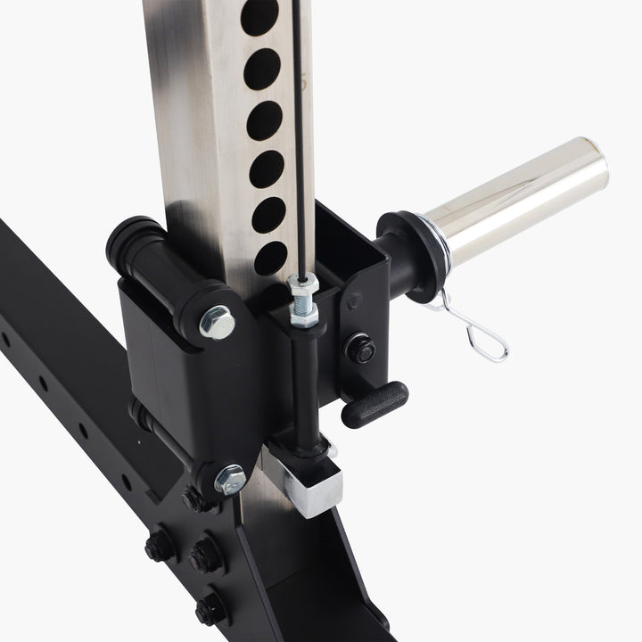 Close-up of a mechanical component with black and silver parts on a white background