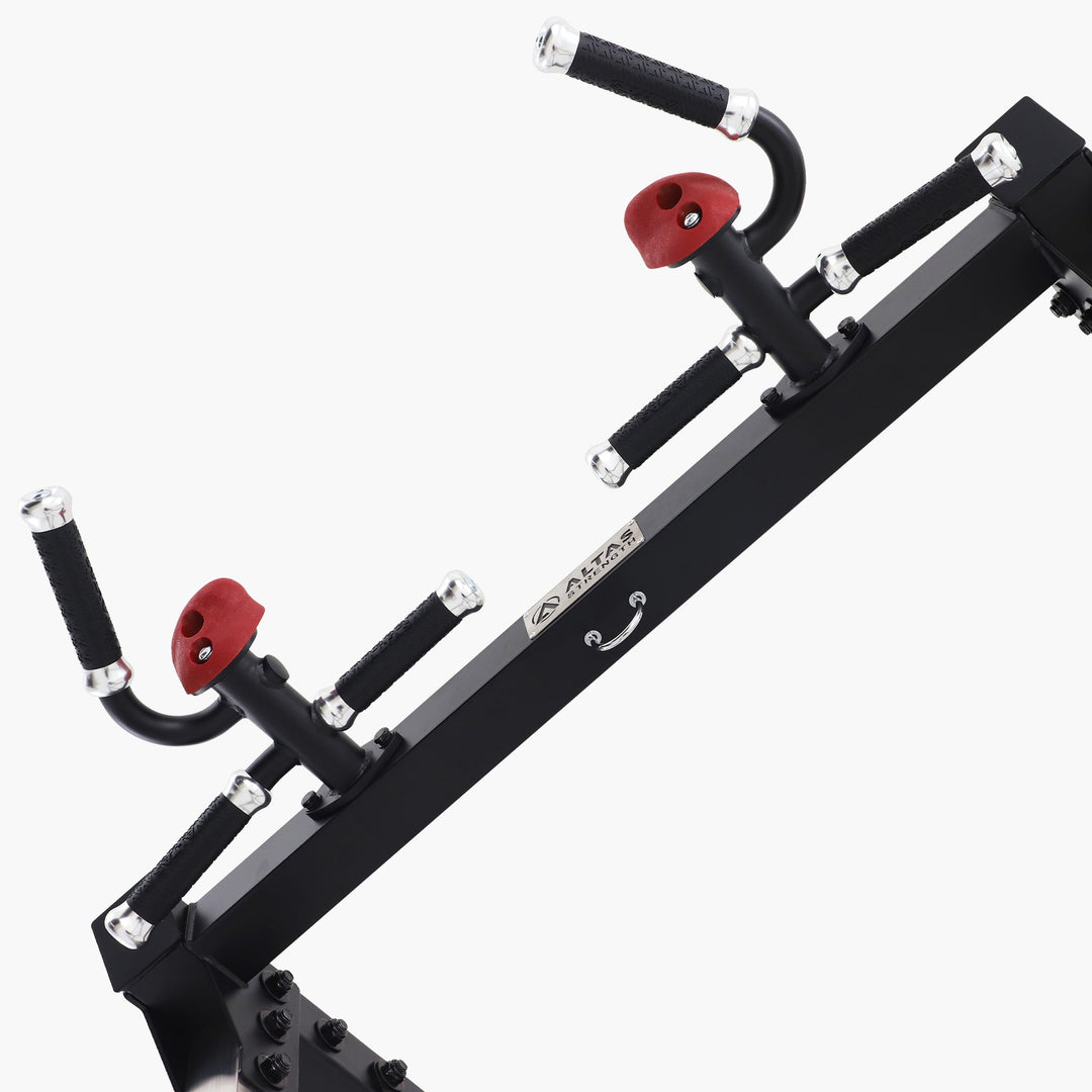 Black bike rack with red connectors on a white background