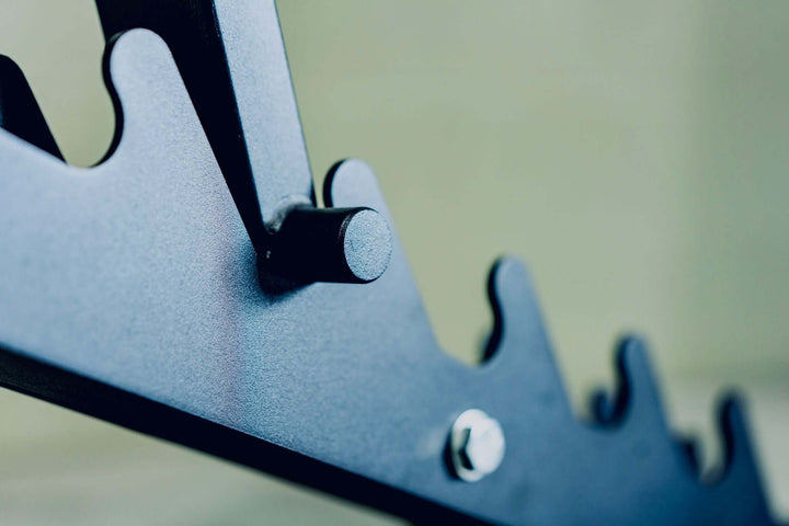 Close-up of the adjustable mechanism on the XRAB03 heavy-duty adjustable bench for versatile workouts.