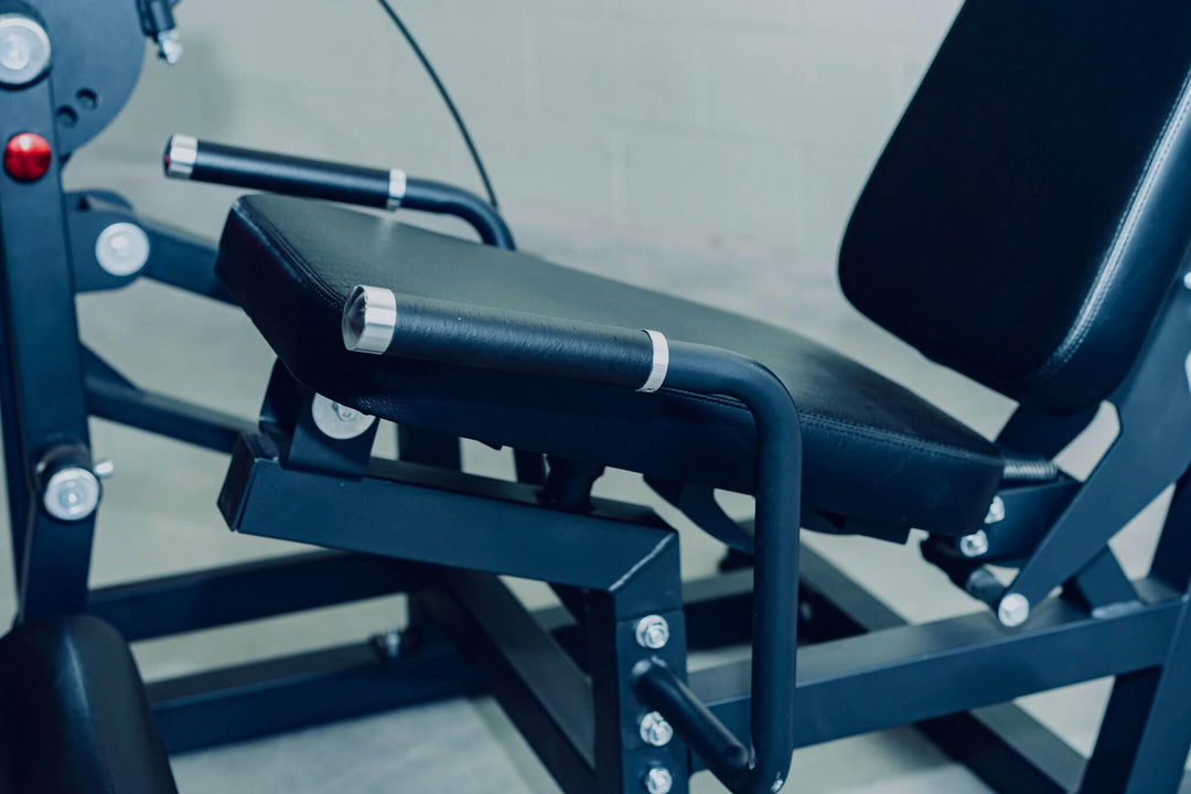 Close-up of the adjustable seat on the X-RIVAL XB05 Leg Extension Machine for targeted leg workouts.